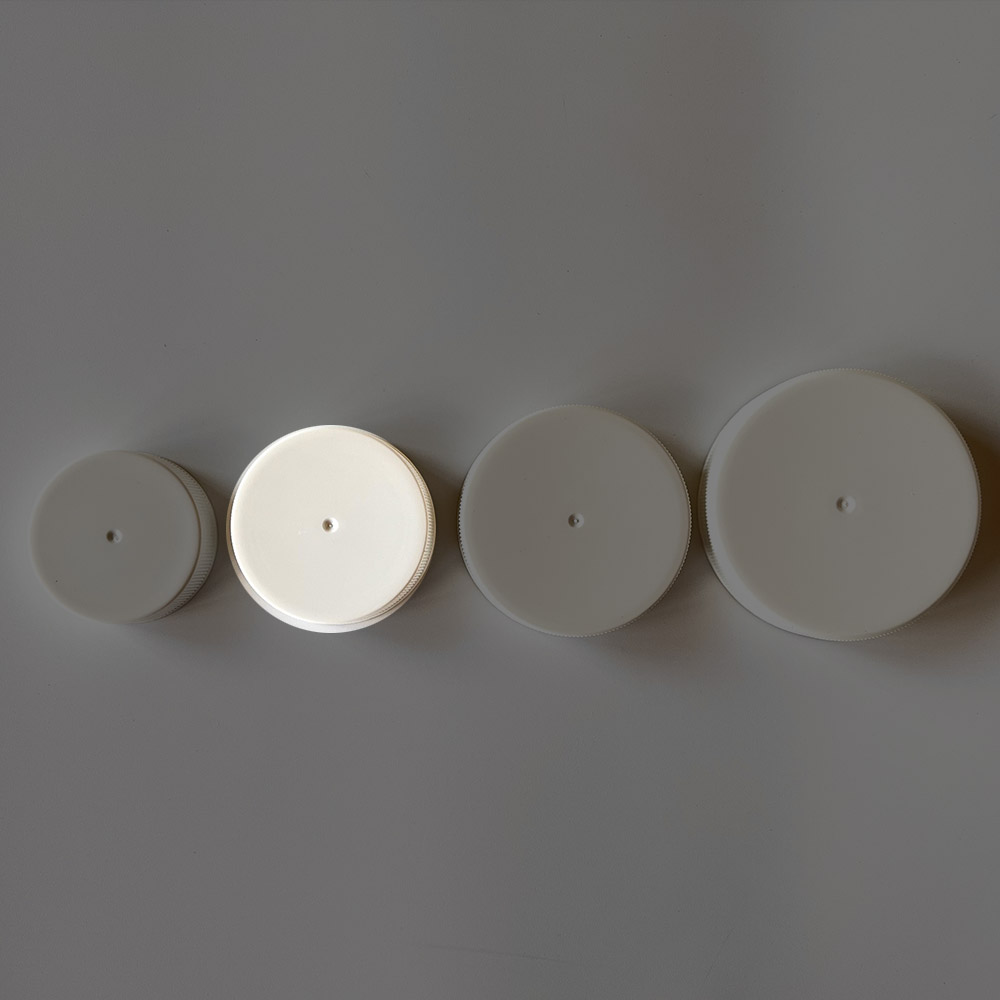 一般蓋-38牙用，直徑4cm，高度:1.3cm。